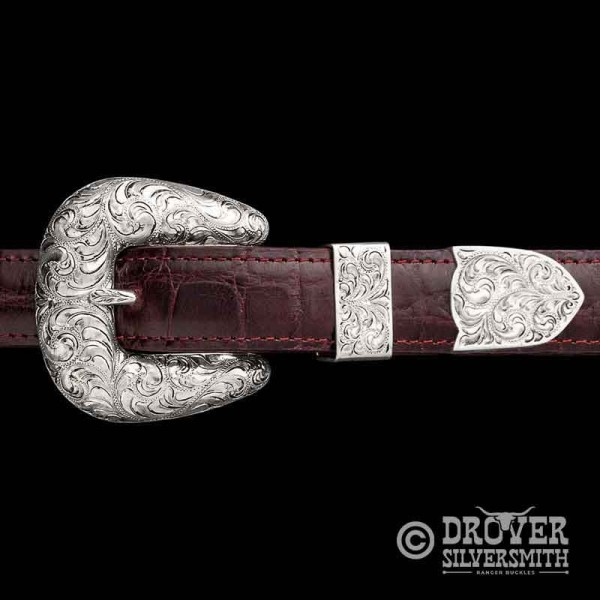 A silver hand engraved buckle set, classy and traditional, great for ranch wear or to top off the look of a designer suit. 